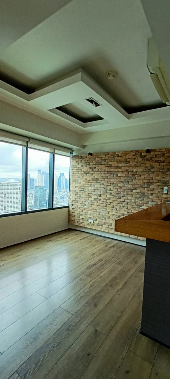 2BR Semi-furnished w/ 1 Parking Slot in Makati - One Rockwell East Tower